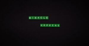 Motivational image featuring the words 'Miracle Happens' using green tiles on a black backdrop.