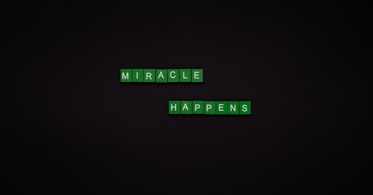 Motivational image featuring the words 'Miracle Happens' using green tiles on a black backdrop.