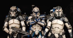 Detailed shot of Star Wars clone trooper action figures in combat-ready stance.