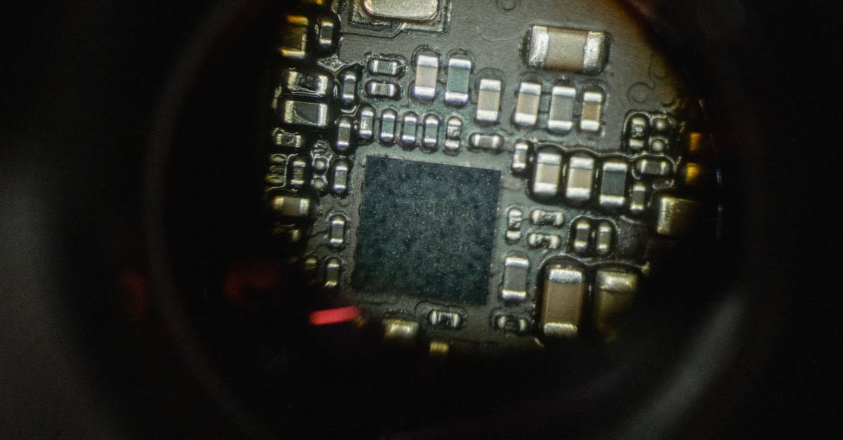 Detailed macro shot of an electronic circuit board showcasing intricate components.