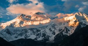 Captivating sunrise illuminating the snow-capped peaks of Nanga Parbat in Pakistan.